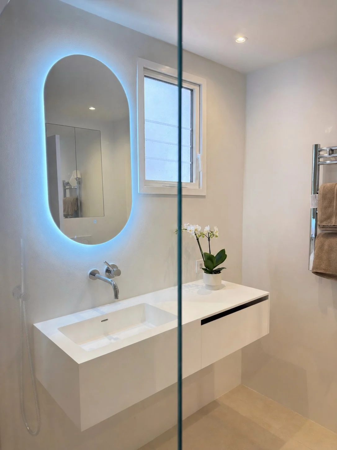 Modern vanity with illuminated mirror